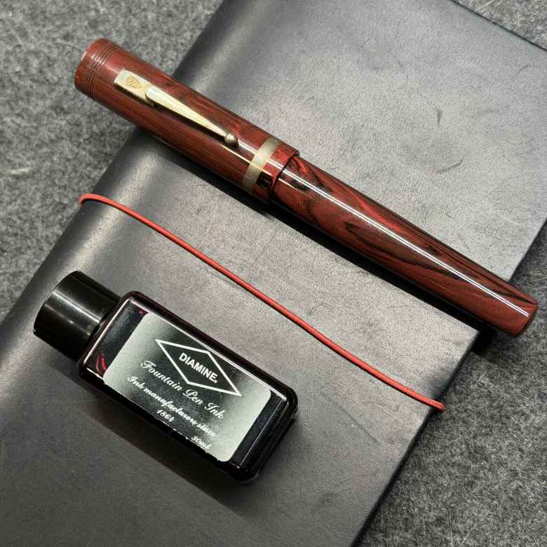 Red Ripple Scriptorium Pens Custom IM filled with Diamine Oxblood