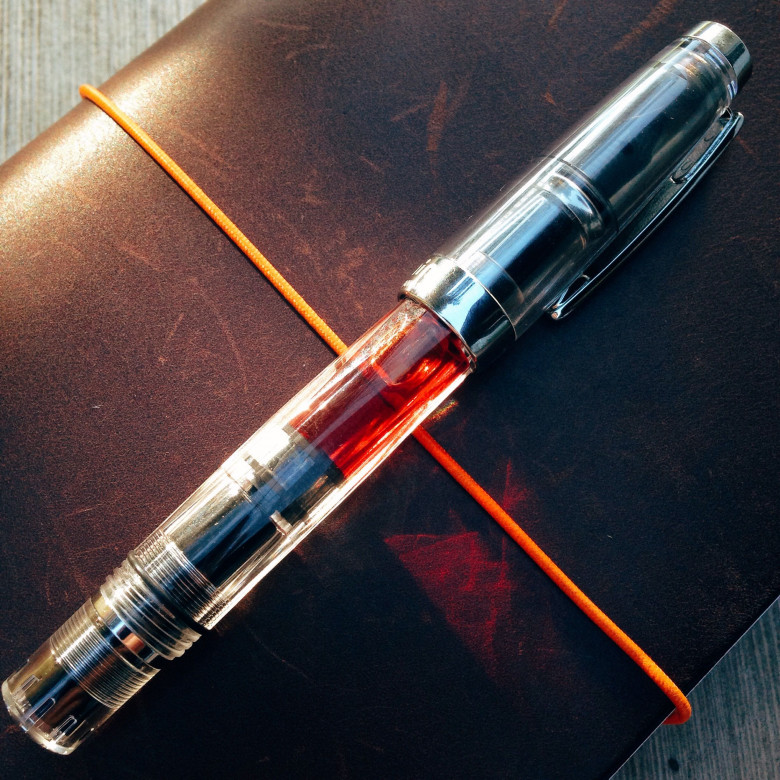 Clear TWSBI Mini (IM) filled with Diamine Pumpkin