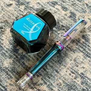 Iris TWSBI Vac 700R (Extra Fine) filled with Waterman Inspired Blue