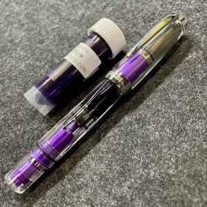 Purple TWSBI Diamond Mini AL Extra Fine filled with Diamine Grape